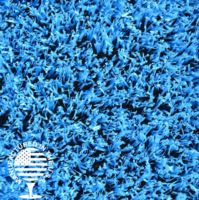 Close-up of vibrant blue artificial grass turf, manufactured in the USA, designed for durable playgrounds, sports surfaces, and creative landscape applications by Southwest Greens.