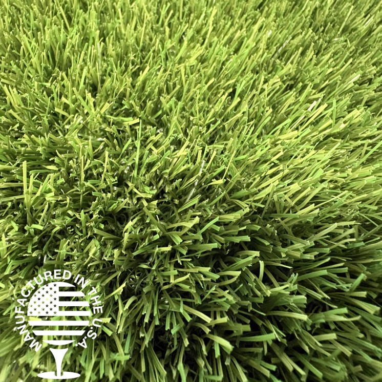 Close up image of artificial turf with a Manufactured in the USA logo in the bottom left.